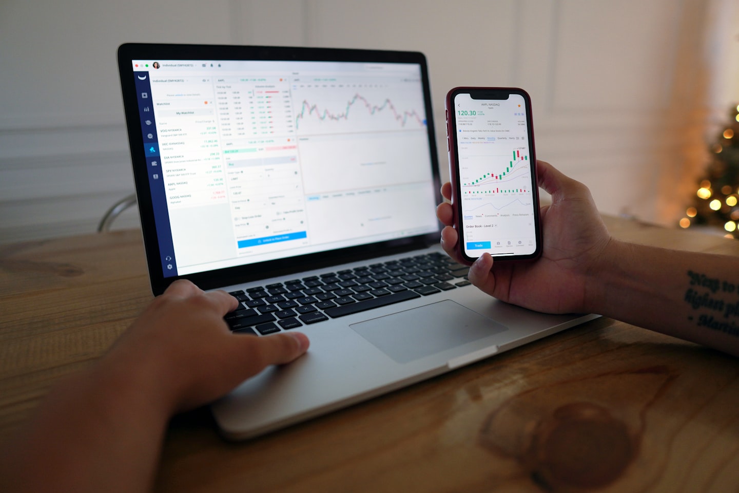 Wallet app on smartphone beside laptop showing modern crypto billing flow for AI API onboarding