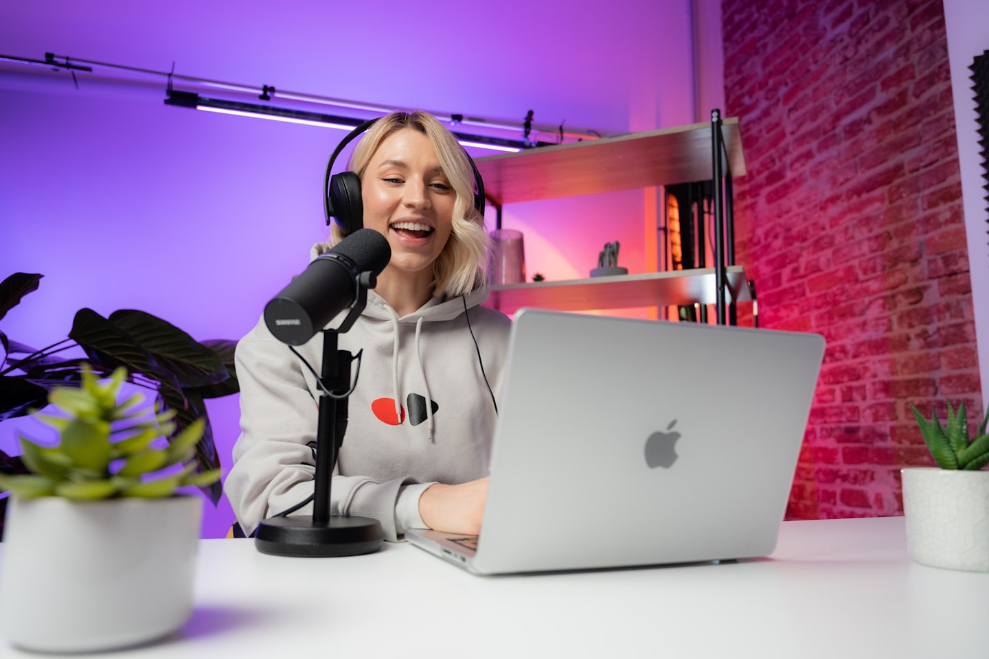Creator in a modern studio setting representing crypto subscriptions for fan platform monetization