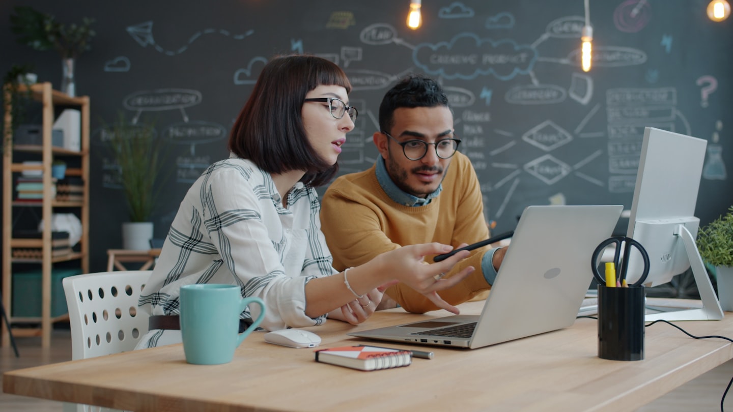 team discussing crypto billing for saas